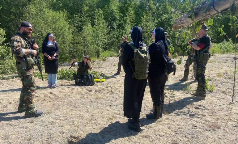 Me on the right pulling security For Chaos 8 during the search of three captured and suspected dangerous nuns.